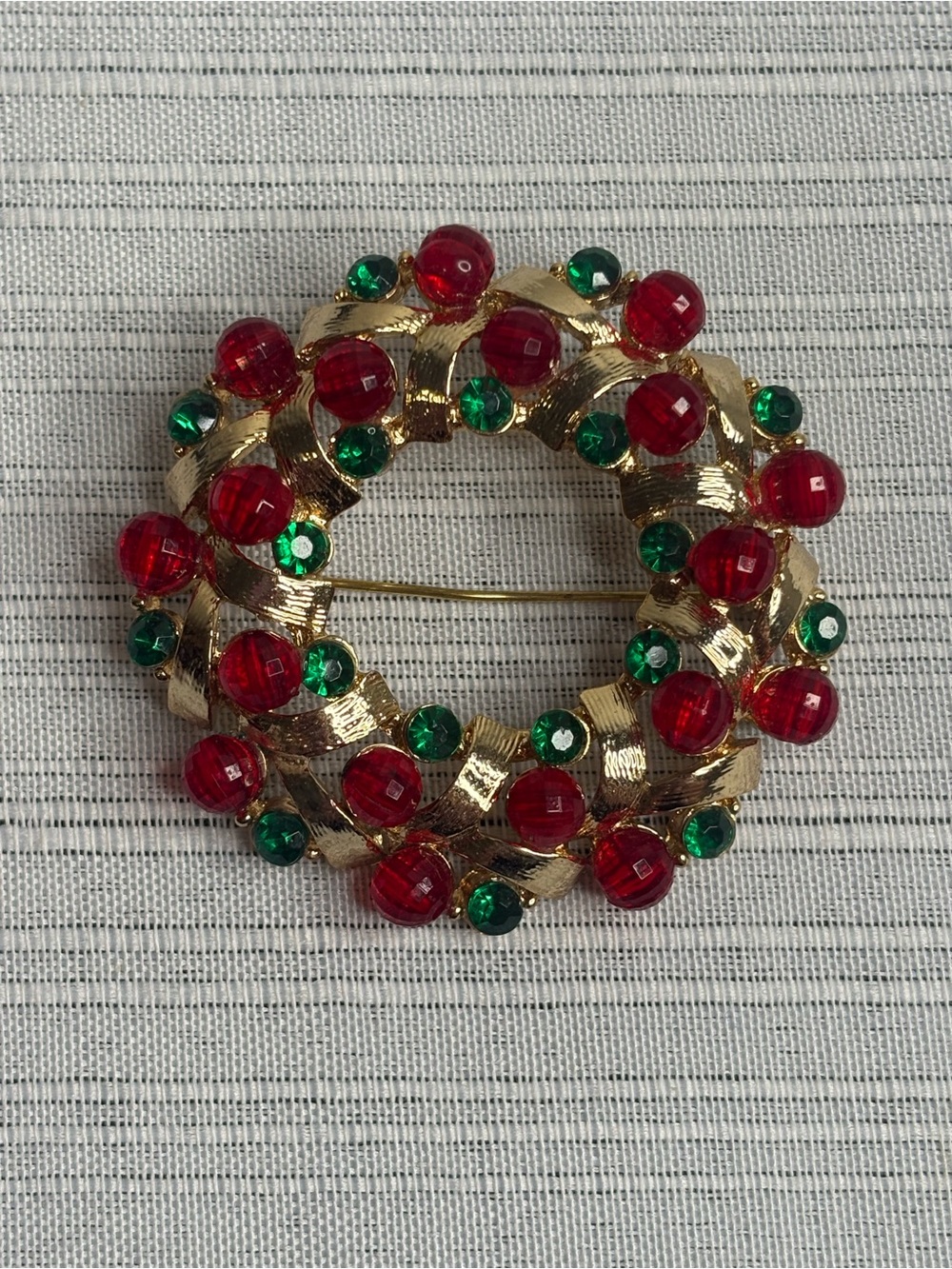 Gold-Tone Holiday Wreath Brooch with Red and Green Stones